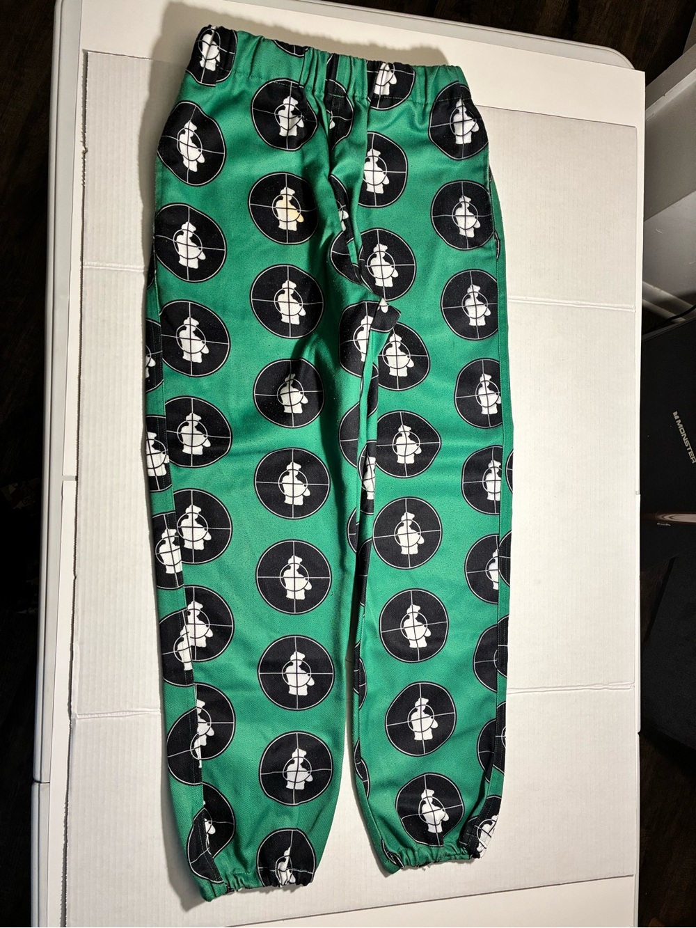 Supreme Green Jogger Pants with Black & White Target Graphic